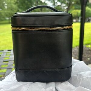Chanel Black lambskin Leather make up bag with coa